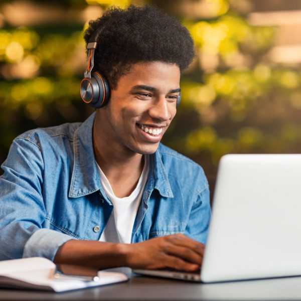 Student-smiling-on-laptop