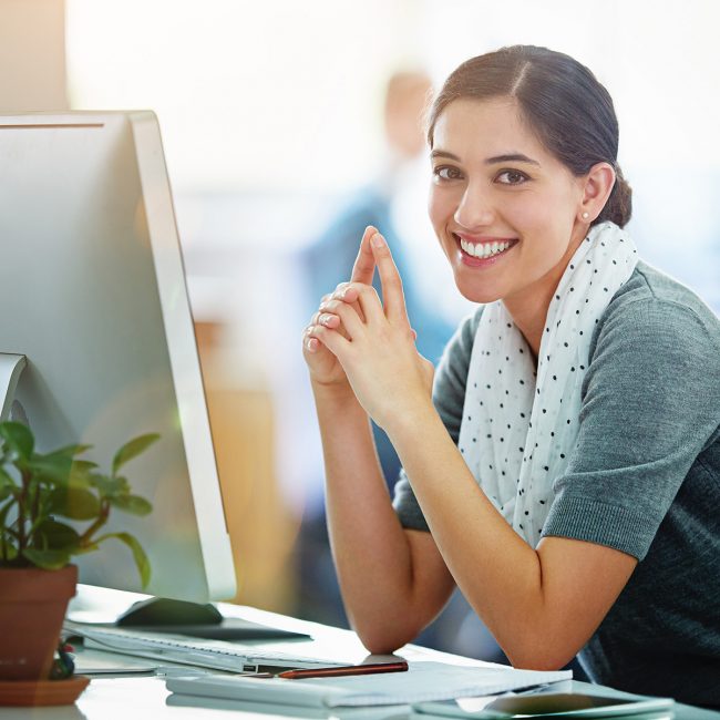 square-smiling-woman-computer